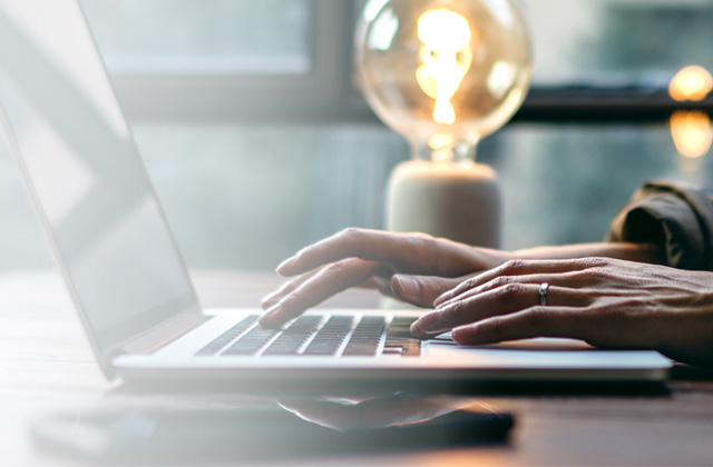 Ricoh Insights - woman sitting at desk